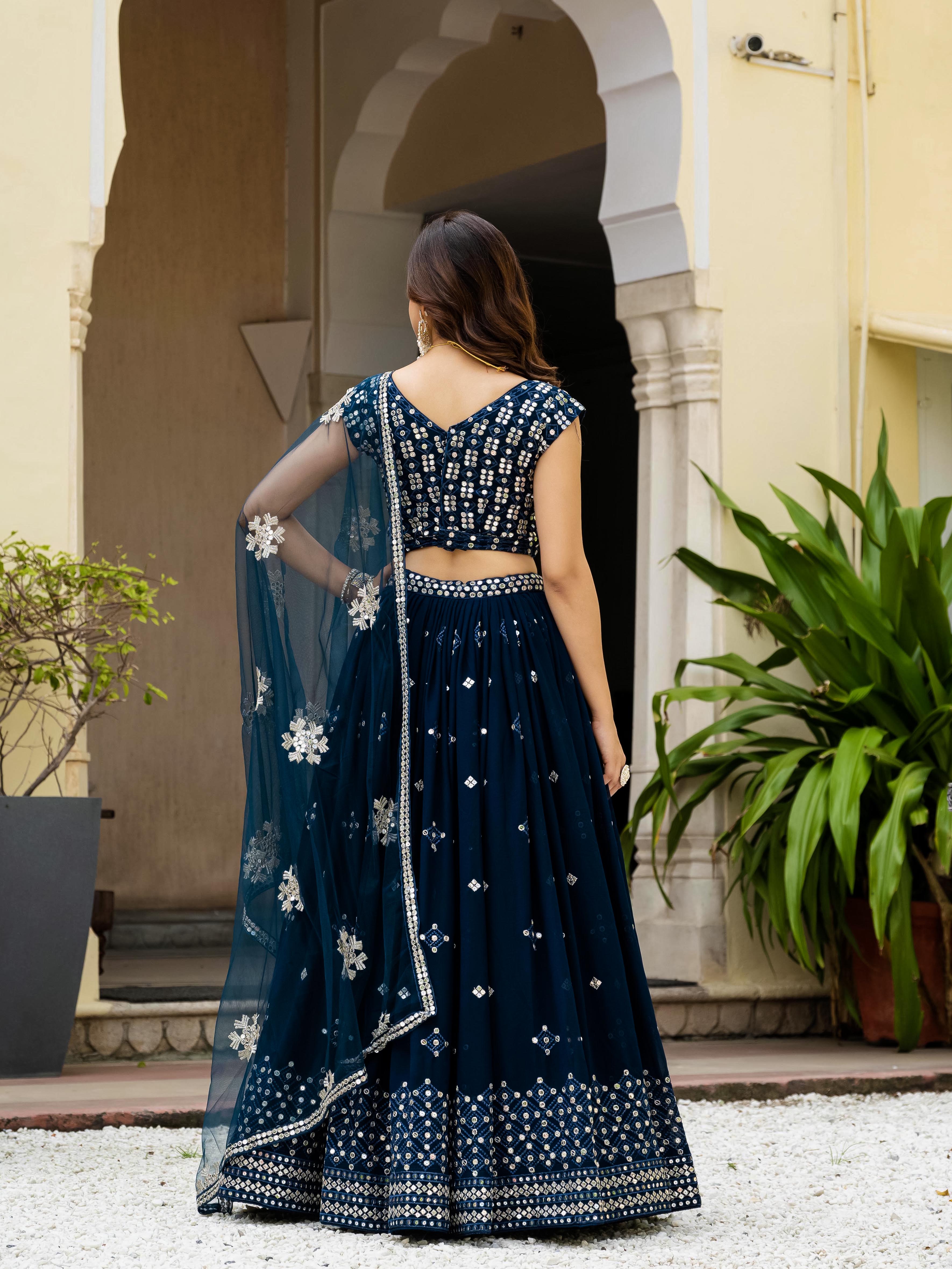 Women's Faux Georgette Heavy Embroidered Semi-Stitched Lehenga Choli with Net Dupatta