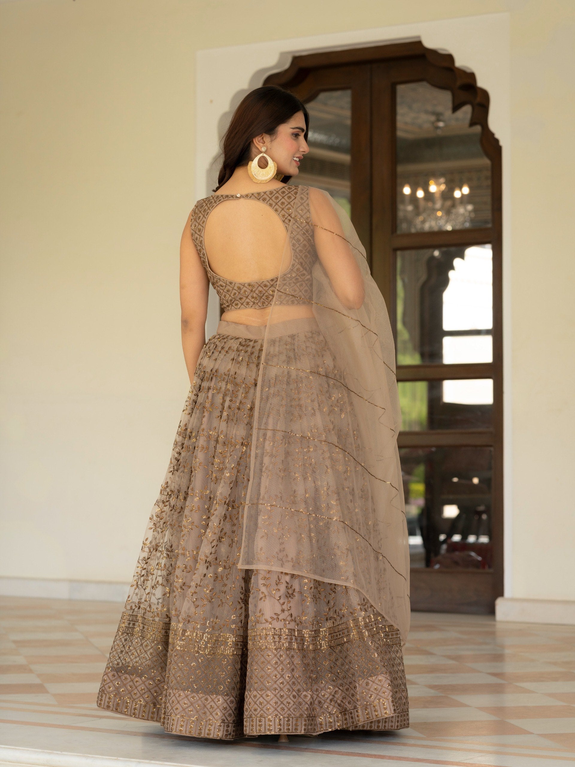 Women's Net Embroidered Semi-Stitched Lehenga Choli with Net Dupatta