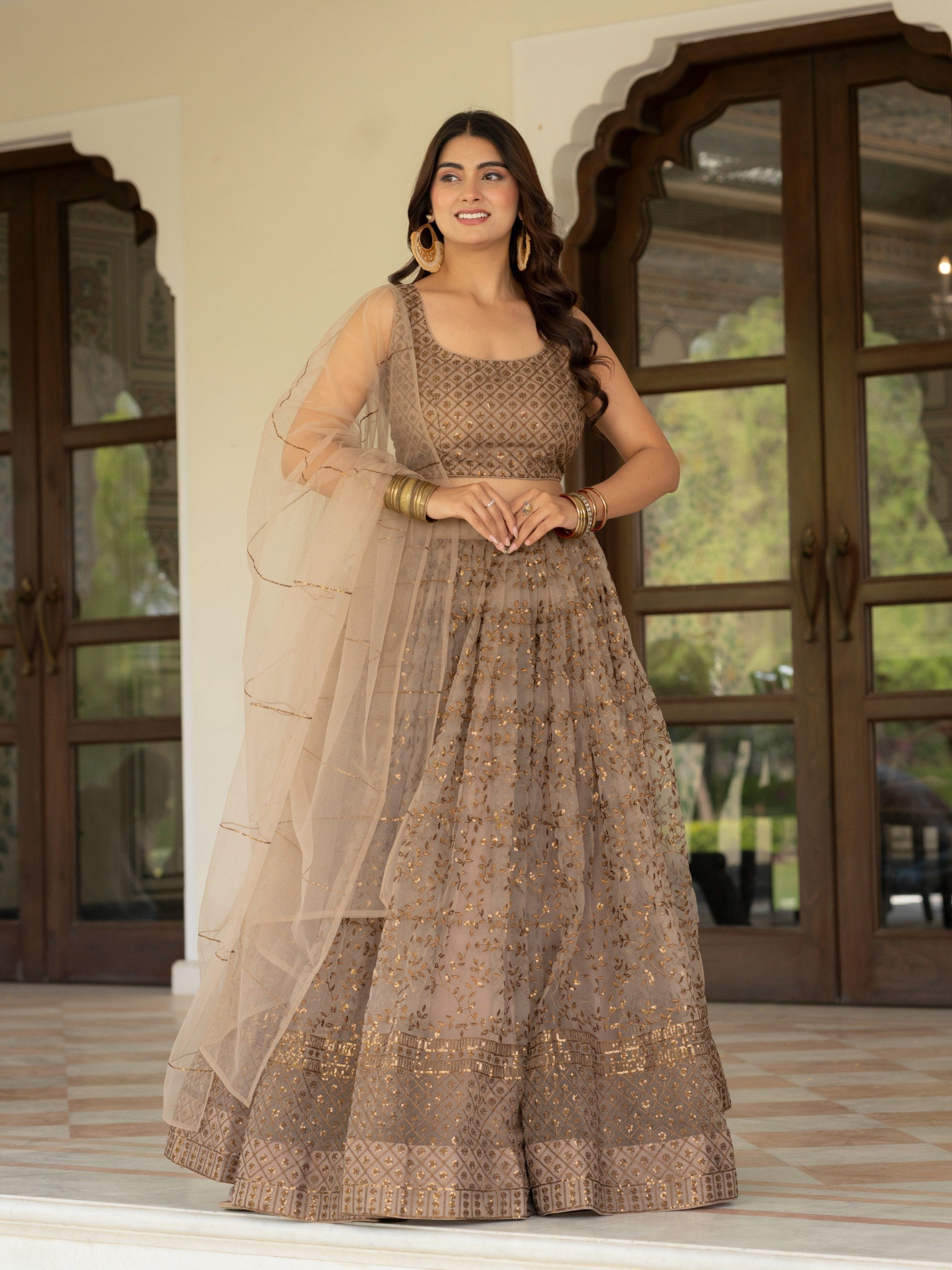 Women's Net Embroidered Semi-Stitched Lehenga Choli with Net Dupatta