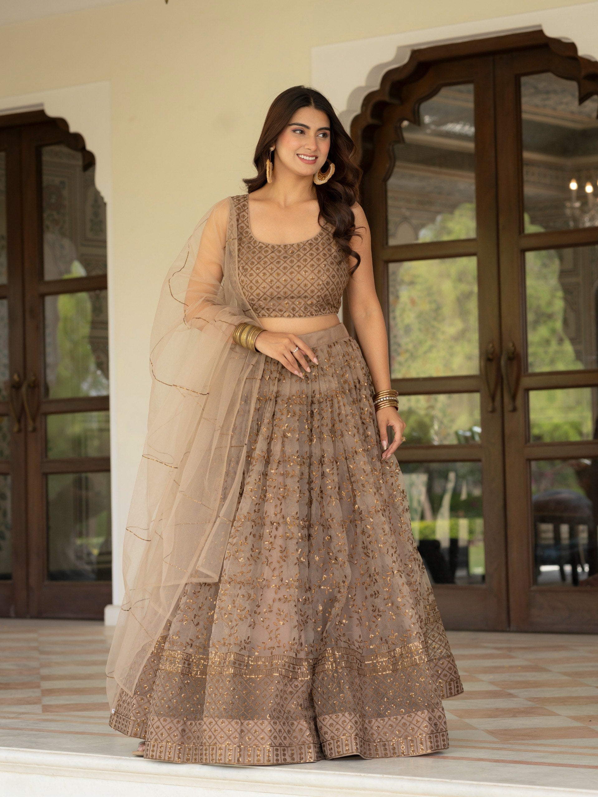 Women's Net Embroidered Semi-Stitched Lehenga Choli with Net Dupatta